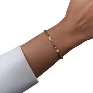 دستبند طلا توپی با پلاک شبدر