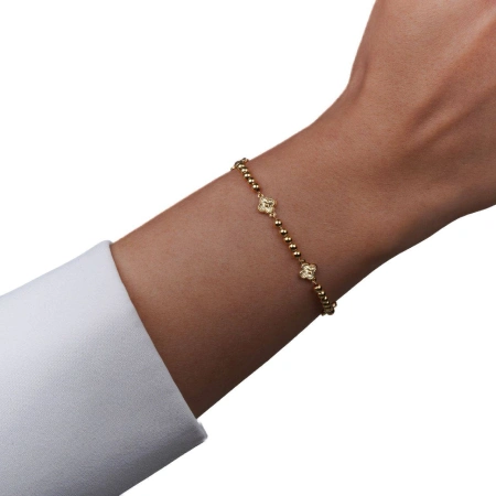 دستبند طلا توپی با پلاک شبدر